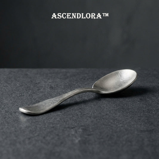 🌑Ascendlora™ THE PETRIFIED SILVER TASTING SPOON-"Taste is a sensory architecture. A tool forged to bridge the gap between the primal earth and the refined palate, ensuring every note is captured in a cold, mineral embrace."